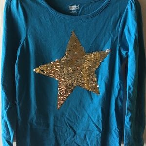 Girls Long sleeve flippy Star top.. Size M (7/8)